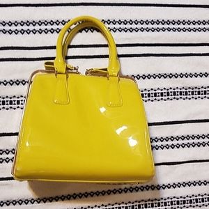 Shiny yellow purse